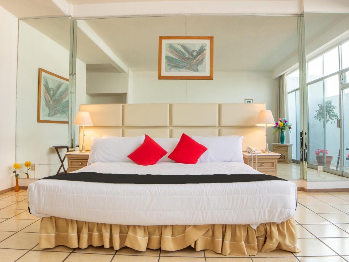 Capital O Hotel Villa Monini Пуебла Екстериор снимка
