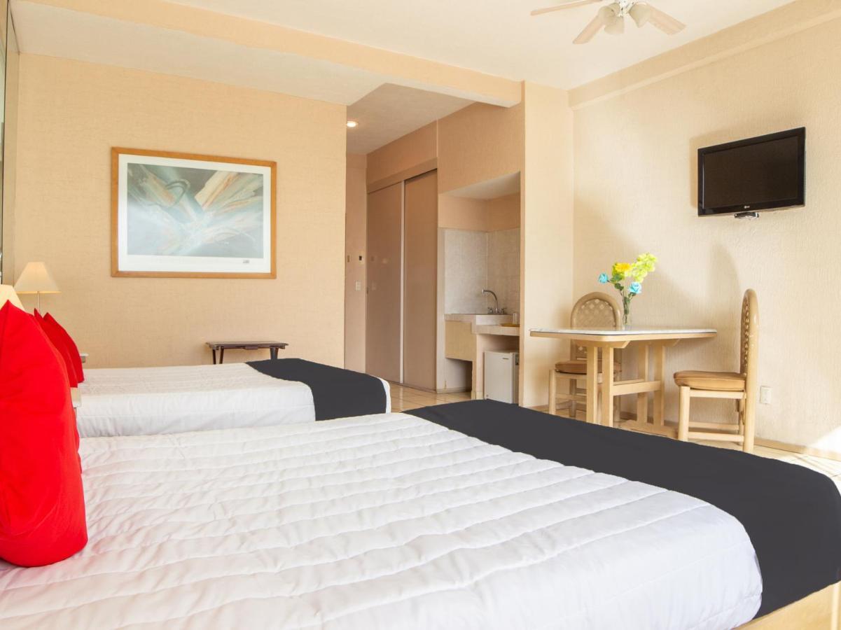 Capital O Hotel Villa Monini Пуебла Екстериор снимка
