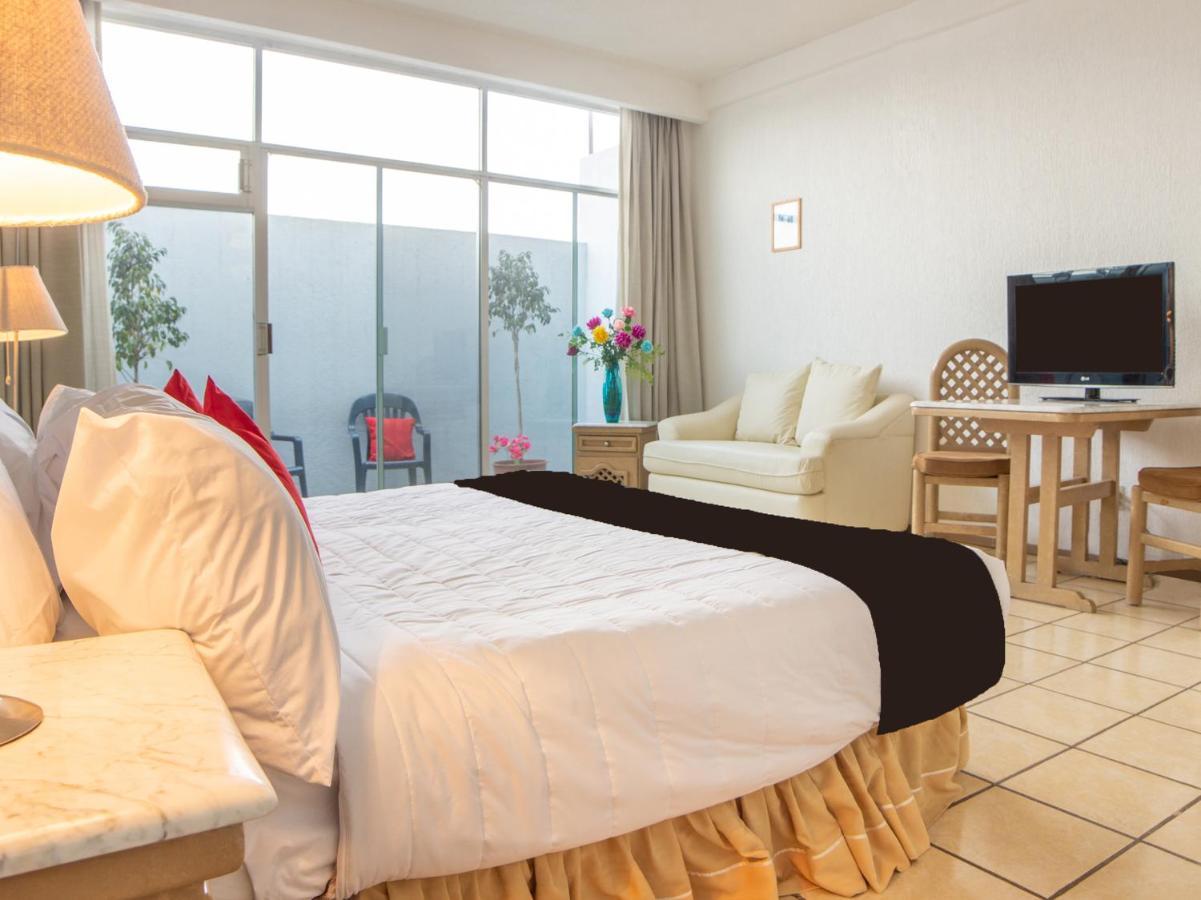 Capital O Hotel Villa Monini Пуебла Екстериор снимка