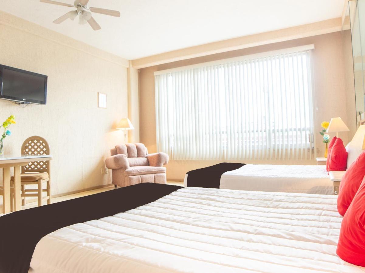 Capital O Hotel Villa Monini Пуебла Екстериор снимка